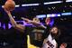 LOS ANGELES, CA - JANUARY 06: Thomas Robinson #15 of the Los Angeles Lakers makes a shot past Derrick Williams #22 of the Miami Heat in the second half of the game at Staples Center on January 6, 2017 in Los Angeles, California. Clarkson was ejected from