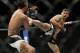 Rodriguez throws a kick at UFC 197.