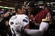 LANDOVER, MD - JANUARY 06: Robert Griffin III #10 of the Washington Redskins embraces Russell Wilson #3 of the Seattle Seahawks after the Seahawks defeated the Redskins 24 to 14 during the NFC Wild Card Playoff Game at FedExField on January 6, 2013 in L