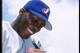 11 May 1997: Outfielder Vladimir Guerrero of the Montreal Expos signs his autograph on a ball during a game against the Los Angeles Dodgers at Dodger Stadium in Los Angeles, California. The Expos won the game 6-3. Mandatory Credit: Jose L. Marin /Allsp