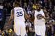 OAKLAND, CA - JANUARY 12: Kevin Durant #35 and Draymond Green #23 of the Golden State Warriors smile as the run back down court during their game against the Detroit Pistons at ORACLE Arena on January 12, 2017 in Oakland, California. NOTE TO USER: User