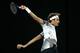 MELBOURNE, AUSTRALIA - JANUARY 20: Roger Federer of Switzerland plays a backhand in his third round match against Thomas Berdych of the Czech Republic on day five of the 2017 Australian Open at Melbourne Park on January 20, 2017 in Melbourne, Australia.