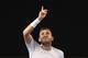 MELBOURNE, AUSTRALIA - JANUARY 20: Daniel Evans of Great Britain celebrates match point and winning his third round match against Bernard Tomic of Australia on day five of the 2017 Australian Open at Melbourne Park on January 20, 2017 in Melbourne, Austr