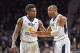 MANHATTAN, KS - JANUARY 21: Players Jevon Carter #2 of the West Virginia Mountaineers talks with teammate Daxter Miles Jr. #4 during the first half against the Kansas State Wildcats on January 21, 2017 at Bramlage Coliseum in Manhattan, Kansas. (Photo b