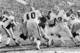 Ken Stabler hands off to Pete Banaszak.