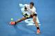 Rafael Nadal of Spain hits a return against Roger Federer of Switzerland during the men's singles final on day 14 of the Australian Open tennis tournament in Melbourne on January 29, 2017. / AFP / PETER PARKS / IMAGE RESTRICTED TO EDITORIAL USE - STRICTLY