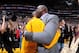 LOS ANGELES, CA - APRIL 13: Kobe Bryant #24 of the Los Angeles Lakers hugs NBA Legend, Magic Johnson after he introduces him before his last game against the Utah Jazz on April 13, 2016 at Staples Center in Los Angeles, California. NOTE TO USER: User exp