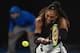 Serena Williams of the US hits a return against Venus Williams of the US during the women's singles final on day 13 of the Australian Open tennis tournament in Melbourne on January 28, 2017. / AFP / PAUL CROCK / IMAGE RESTRICTED TO EDITORIAL USE - STRICTL