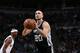 Milwaukee, WI - DECEMBER 5: Manu Ginobili #20 of the San Antonio Spurs shoots a free throw during a game against the Milwaukee Bucks on December 5, 2016 at the BMO Harris Bradley Center in Milwaukee, Wisconsin. NOTE TO USER: User expressly acknowledges a
