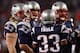 FOXBOROUGH, MA - JANUARY 12: Tom Brady #12 of the New England Patriots stands in the huddle with Kevin Faulk #33 against the Jacksonville Jaguars during the AFC Divisional playoff game at Gillette Stadium game on January 12, 2008 in Foxboro, Massachusett