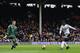 Fulham's English defender Ryan Sessegnon (R) scores their third goal during the English FA Cup fourth round football match between Fulham and Hull City at Craven Cottage in London on January 29, 2017. / AFP / Glyn KIRK / RESTRICTED TO EDITORIAL USE. No us