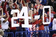 Feb 4, 2017; Spokane, WA, USA; Gonzaga Bulldogs students holds up the Bulldogs current overall record after a game against the Santa Clara Broncos at McCarthey Athletic Center. The Bulldogs won 90-55. Mandatory Credit: James Snook-USA TODAY Sports