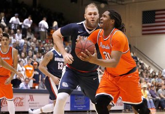 MALIBU, CA - JANUARY 28: Nolan Taylor #31 of the Pepperdine Waves looks to shoot the ball while being guarded by Przemek Karnowski #24 of the Gonzaga Bulldogs during the game against the Gonzaga Bulldogs at Firestone Fieldhouse on January 28, 2017 in Mali