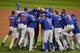 CLEVELAND, OH - NOVEMBER 02: The Chicago Cubs celebrate after defeating the Cleveland Indians 8-7 in Game Seven of the 2016 World Series at Progressive Field on November 2, 2016 in Cleveland, Ohio. The Cubs win their first World Series in 108 years. (Ph