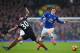 LIVERPOOL, ENGLAND - JANUARY 15: Ross Barkley of Everton is tackled by Nicolas Otamendi of Manchester City during the Premier League match between Everton and Manchester City at Goodison Park on January 15, 2017 in Liverpool, England. (Photo by Alex Liv