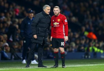 WEST BROMWICH, ENGLAND - DECEMBER 17: Jose Mourinho, Manager of Manchester United (L) speaks to Wayne Rooney of Manchester United (R) during the Premier League match between West Bromwich Albion and Manchester United at The Hawthorns on December 17, 2016