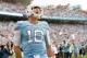 CHAPEL HILL, NC - NOVEMBER 07: Mitch Trubisky #10 of the North Carolina Tar Heels reacts after scoring a touchdown against the Duke Blue Devils during their game at Kenan Stadium on November 7, 2015 in Chapel Hill, North Carolina. North Carolina won 66-3