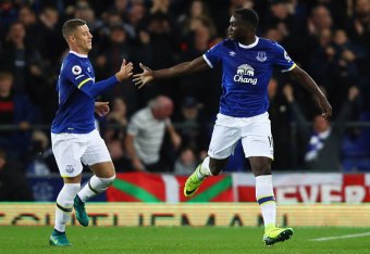 LIVERPOOL, ENGLAND - SEPTEMBER 30:  Romelu Lukaku of Everton (R) celebrates with team mate Ross Barkley (L) as he scores their first goal from a free kick during the Premier League match between Everton and Crystal Palace at Goodison Park on September 30,