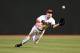 PHOENIX, AZ - APRIL 28: A.J. Pollock #11 of the Arizona Diamondbacks attempts to make a diving catch against the Colorado Rockies at Chase Field on April 28, 2015 in Phoenix, Arizona. (Photo by Norm Hall/Getty Images)