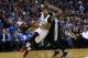 NEW ORLEANS, LA - MARCH 03: Anthony Davis #23 of the New Orleans Pelicans drives against LaMarcus Aldridge #12 of the San Antonio Spurs during the second half of a game at the Smoothie King Center on March 3, 2017 in New Orleans, Louisiana. NOTE TO USER: