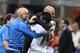 Real Madrid's Brazilian midfielder Casemiro (R) and Real Madrid's French coach Zinedine Zidane (2nd R) celebrate after Real Madrid won the UEFA Champions League final football match over Atletico Madrid at San Siro Stadium in Milan, on May 28, 2016. / AF
