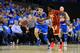 Ball dribbles past USC's Jonah Mathews on February 18, 2017, in Los Angeles.