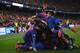 BARCELONA, SPAIN - MARCH 08: Sergi Roberto of Barcelona (obscured) celebrates with team mates as he scores their sixth goal during the UEFA Champions League Round of 16 second leg match between FC Barcelona and Paris Saint-Germain at Camp Nou on March 8,