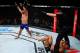 Gastelum walks away from a downed and defeated Belfort.