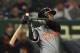 Netherlands' Didi Gregorius hits a three-run homer in the top of the fourth inning during the World Baseball Classic Pool E second round match between Israel and the Netherlands at Tokyo Dome in Tokyo on March 13, 2017. / AFP PHOTO / KAZUHIRO NOGI