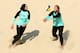 RIO DE JANEIRO, BRAZIL - AUGUST 09: Doaa Elghobashy (L) and Nada Meawad of Egypt in action during the Women's Beach Volleyball Preliminary Pool A match against Marta Menegatti and Laura Giombini of Italy on Day 4 of the Rio 2016 Olympic Games at the Beach