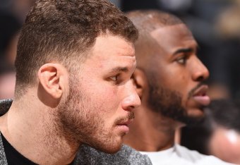 LOS ANGELES, CA - JANUARY 2:  Blake Griffin #32 and Chris Paul #3 of the LA Clippers watch the game against the Phoenix Suns on January 2, 2017 at STAPLES Center in Los Angeles, California. NOTE TO USER: User expressly acknowledges and agrees that, by dow