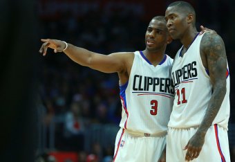 LOS ANGELES, CA - MARCH 15: Chris Paul #3 of the Los Angeles Clippers talks with teammate Jamal Crawford #11 during the NBA game against the Milwaukee Bucks at Staples Center on March 15, 2017 in Los Angeles, California. The Bucks defeated the Clippers 97