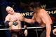 The Great Khali on the attack against Kane.