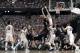 SCAR's Rakym Felder challenges Gonzaga's Zach Collins at the rim.