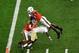 Nov 5, 2016; Miami Gardens, FL, USA; Miami Hurricanes tight end David Njoku (86) leaps over Pittsburgh Panthers defensive back Terrish Webb (2) for a touchdown during the first half at Hard Rock Stadium. Mandatory Credit: Steve Mitchell-USA TODAY Sports