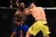 Note how Johnson fires this uppercut under Teixeira's guard.