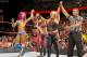 Sasha Banks celebrates a win on the April 3 Raw with Bayley and Dana Brooke.