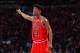 PHILADELPHIA,PA - APRIL 6 : Jimmy Butler #21 of the Chicago Bulls points downcourt against the Philadelphia 76ers at Wells Fargo Center on April 6, 2017 in Philadelphia, Pennsylvania NOTE TO USER: User expressly acknowledges and agrees that, by download