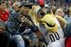 Mar 8, 2017; New Orleans, LA, USA; Quavo from the hip-hop group Migos poses with the New Orleans Pelicans mascot in the second half of the game against the Toronto Raptors at the Smoothie King Center. The Raptors won, 94-87. Mandatory Credit: Chuck Cook-U