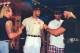 Karl Malone is restrained by Diamond Dallas Page as Hulk Hogan pushes him following a press conference to announce that Malone will meet Dennis Rodman (aka Rodzilla) at the "Bash At The Beach" in July 1998.