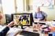 Jean-Pierre Marie (right), president of Kante's first club, JS Suresnes, and assistant general secretary Pierre Ville (left) in their office at Stade Maurice Hubert, showing photos of the young Kante on a computer screen.