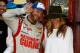 MARTINSVILLE, VA - OCTOBER 26: Dale Earnhardt Jr., driver of the #88 National Guard Chevrolet, celebrates with girlfriend Amy Reimann in Victory Lane after his victory in the NASCAR Sprint Cup Series Goody's Headache Relief Shot 500 at Martinsville Speed