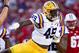 GREEN BAY, WI - SEPTEMBER 3: Arden Key #49 of the LSU Tigers celebrates after making a sack in the fourth quarter against the Wisconsin Badgers at Lambeau Field on September 3, 2016 in Green Bay, Wisconsin. (Photo by Dylan Buell/Getty Images)