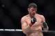 Oct 8, 2016; Manchester, UK; Michael Bisping (red gloves) cut under his left eye during his fight against Dan Henderson (blue gloves) in the UFC 204 at Manchester Arena. Mandatory Credit: Per Haljestam-USA TODAY Sports
