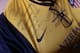 A note from Costa on a signed shirt he sent Flavio reads, "For my coach Flavinho, a hug from the student Diego"