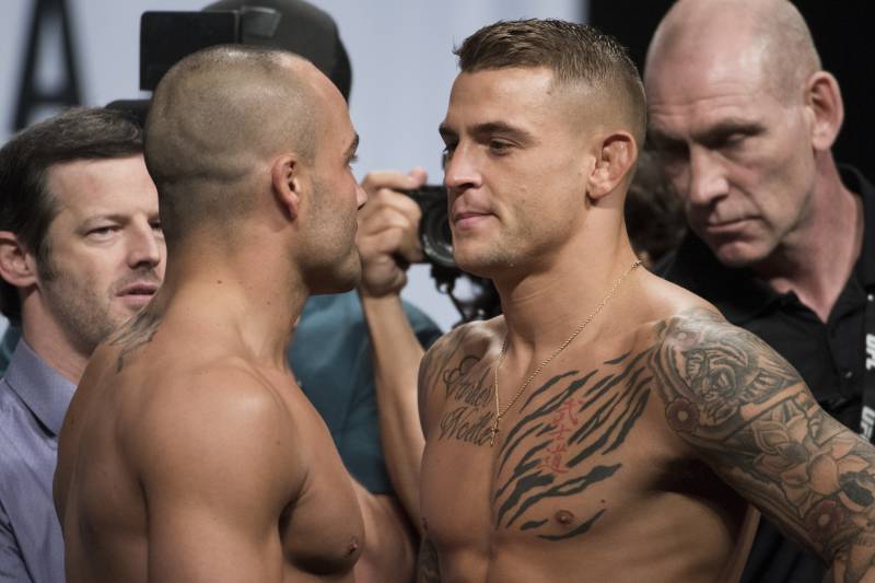 DALLAS, TX - MAY 12: (L to R) Eddie Alvarez faces off with Dustin Poirier during the UFC 211 weigh-in at the American Airlines Center on May 12, 2017 in Dallas, Texas. (Photo by Cooper Neill/Zuffa LLC/Zuffa LLC via Getty Images)