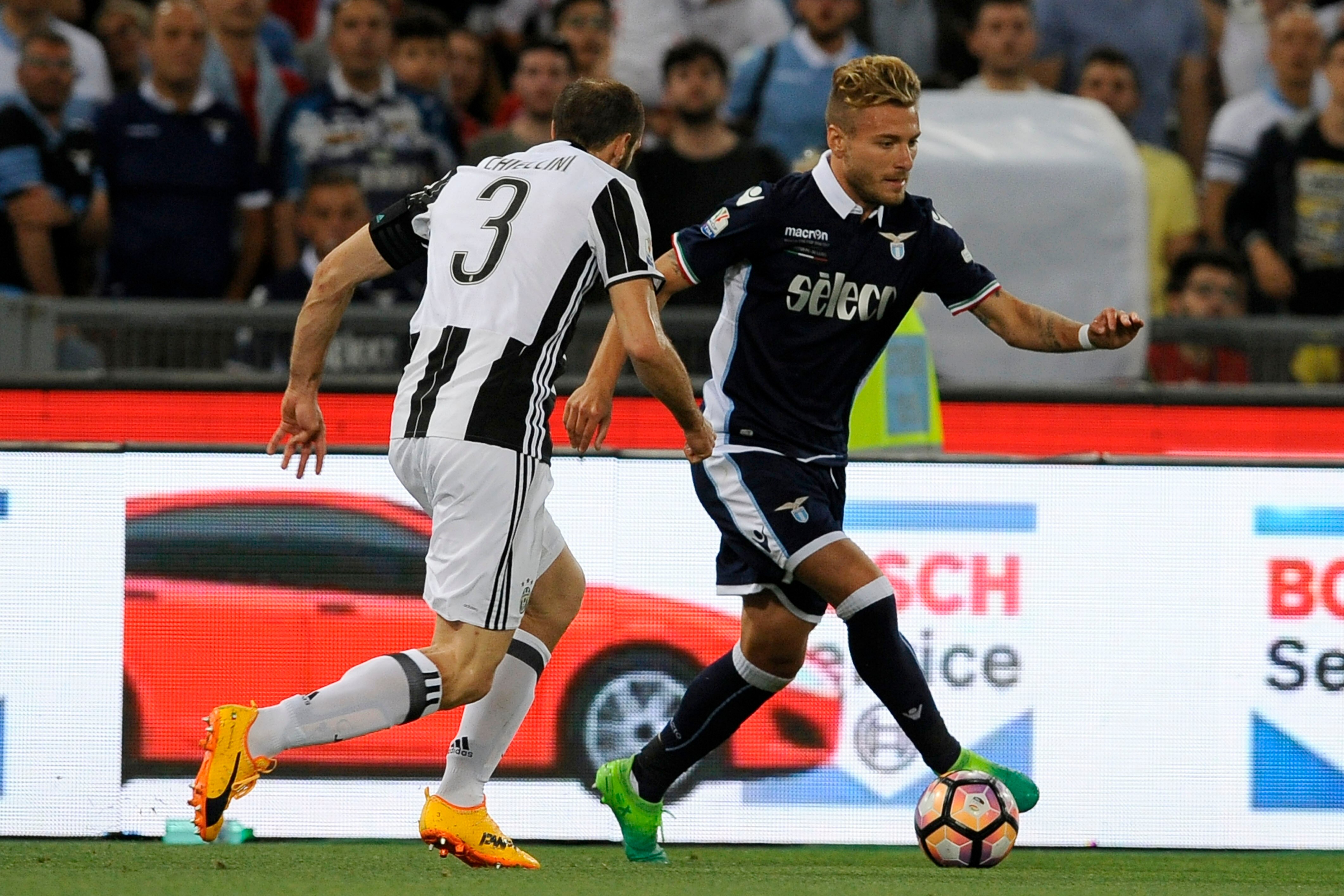 ROME, ROMA - MAY 17:  Giorgio Chiellini of FC Juventus compete for the ball with Ciro Immobile of SS Lazio during the TIM Cup Final match between SS Lazio and Juventus FC at Olimpico Stadium on May 17, 2017 in Rome, Italy.  (Photo by Marco Rosi/Getty Imag