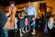 Glenn Jacobs, known as Kane, takes a photo with fans at a sushi restaurant in Tennessee.