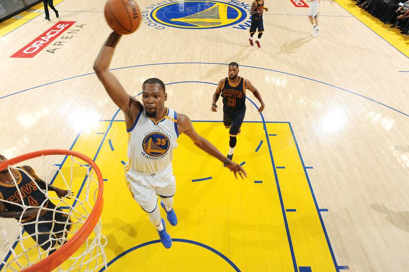 OAKLAND, CA - JUNE 1: Kevin Durant #35 of the Golden State Warriors dunks the ball during the game against the Cleveland Cavaliers during Game One of the 2017 NBA Finals at Oracle Arena on June 1, 2017 in Oakland, California. NOTE TO USER: User expressly