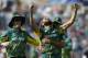 South Africas Imran Tahir (C) celebrates with teammates taking the wicket of Sri Lankas Asela Gunaratne for four runs during the ICC Champions Trophy match between South Africa and Sri Lanka at The Oval in London on June 3, 2017. / AFP PHOTO / Ian KINGTON